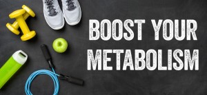 69840169 - fitness equipment on a dark background - boost your metabolism